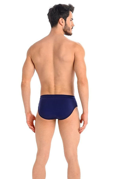 Back view of a model in Teyli luxury grey briefs, demonstrating a comfortable and form-fitting cut made from soft cotton lycra.