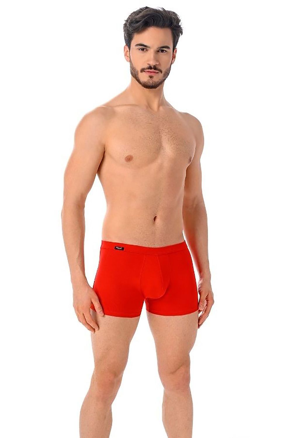 Stylish model showcasing Teyli red men's boxer shorts, highlighting comfort and fit.