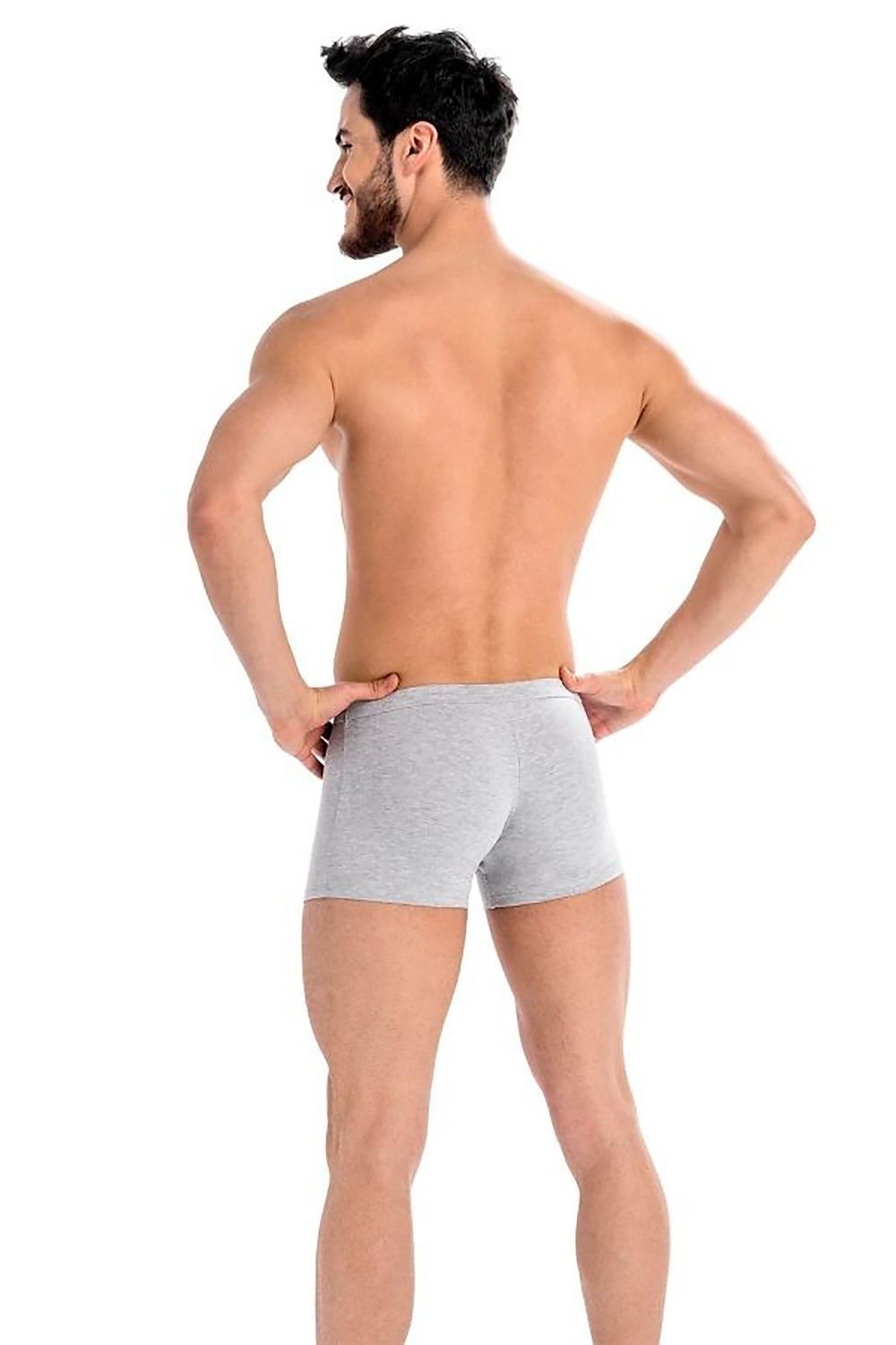 Back view of a model in luxury grey Teyli men's boxer shorts, showcasing a seamless design for refined comfort.