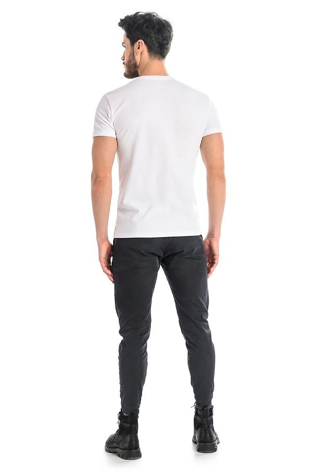 Trendy man in a white cotton T-shirt from Teyli, viewed from the back, highlighting the sleek design and modern aesthetic for daily wear.