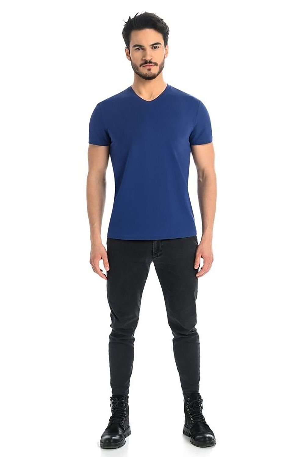 Stylish man wearing a luxury blue men's light grey cotton t-shirt with Lycra by Teyli. The classic V-neck design complements an elegant silhouette, perfect for a contemporary look.