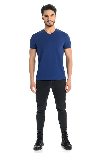 Stylish man wearing a luxury blue men's light grey cotton t-shirt with Lycra by Teyli. The classic V-neck design complements an elegant silhouette, perfect for a contemporary look.