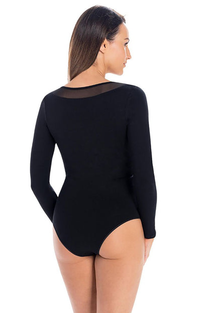 Stylish Teyli women's shapewear bodysuit modelled with tailored pants and a jacket, perfect for elegant layering.