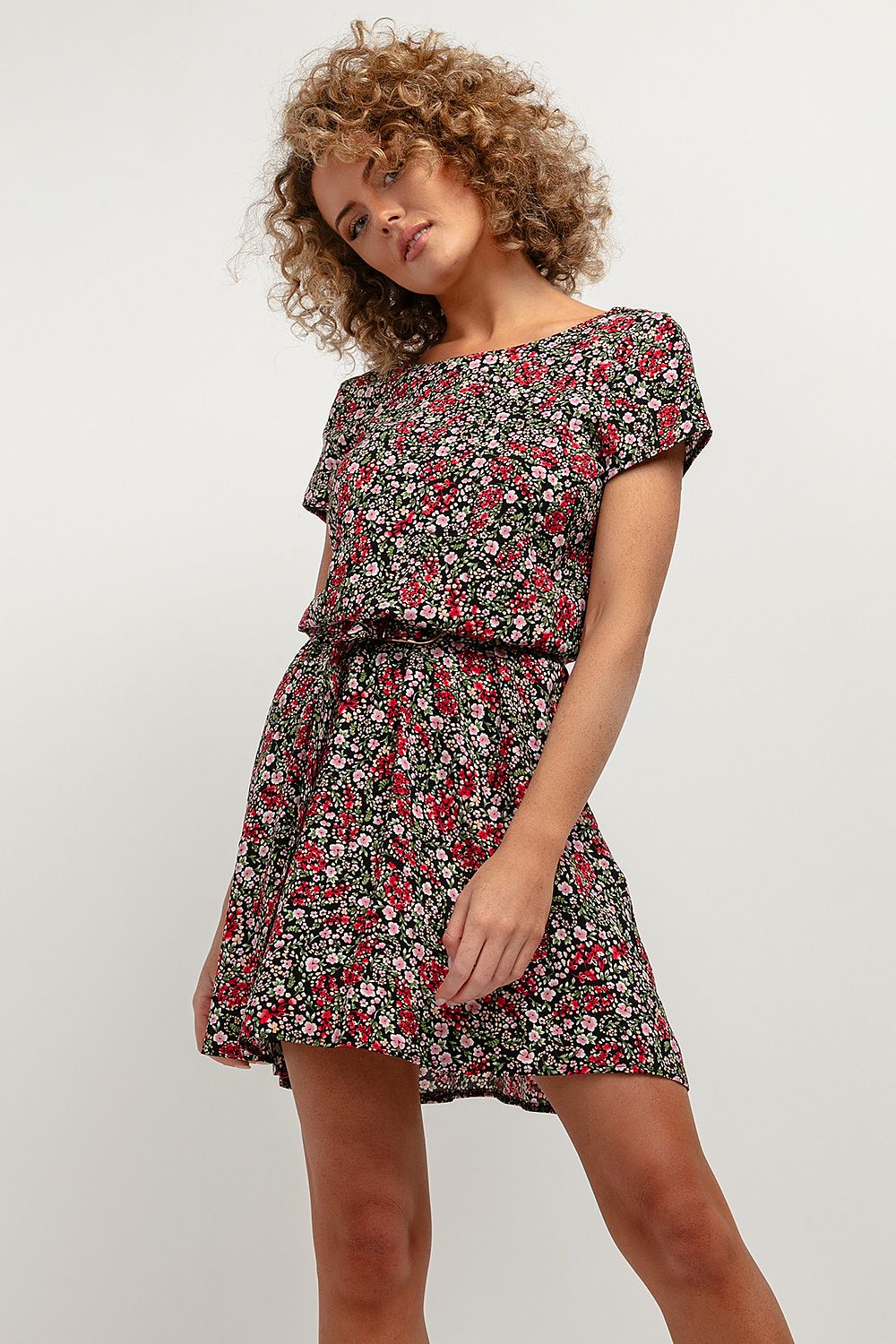 Elegant Floral Daydress by Tessita featuring a loose kimono cut and deep V-neck back, showcasing luxurious floral patterns.
