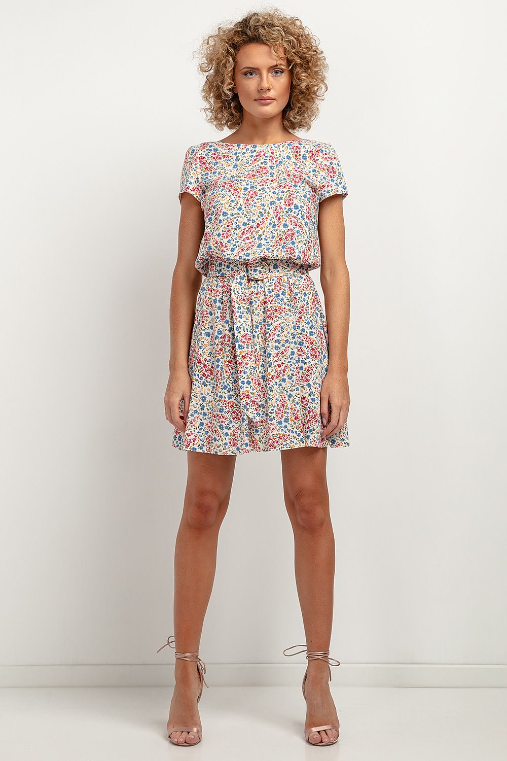 Tessita Elegant Floral Daydress displayed on a mannequin, emphasising its flowing design and luxurious fabric for a chic look.