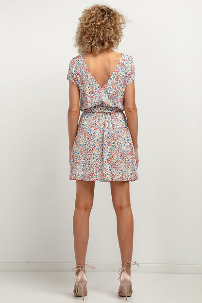 Elegant Floral Daydress by Tessita, featuring a loose kimono cut and luxurious viscose fabric in a floral pattern.