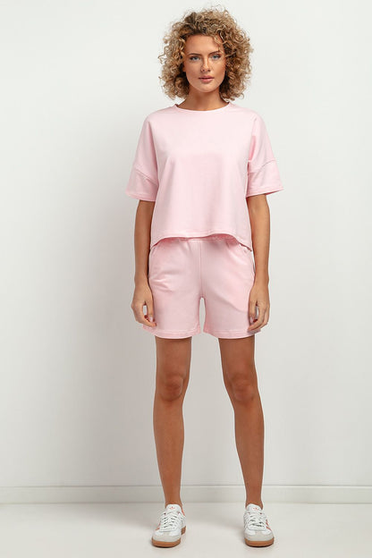 Tessita Urban Style Short Sleeve Blouse in a chic urban setting, showcasing the loose fit and OEKO-TEX cotton blend fabric.