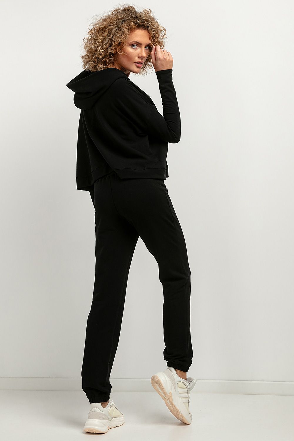 Tessita Luxury Knitted Jogger Sweatpants displayed on a model highlighting the flattering elastic waistband and legs.