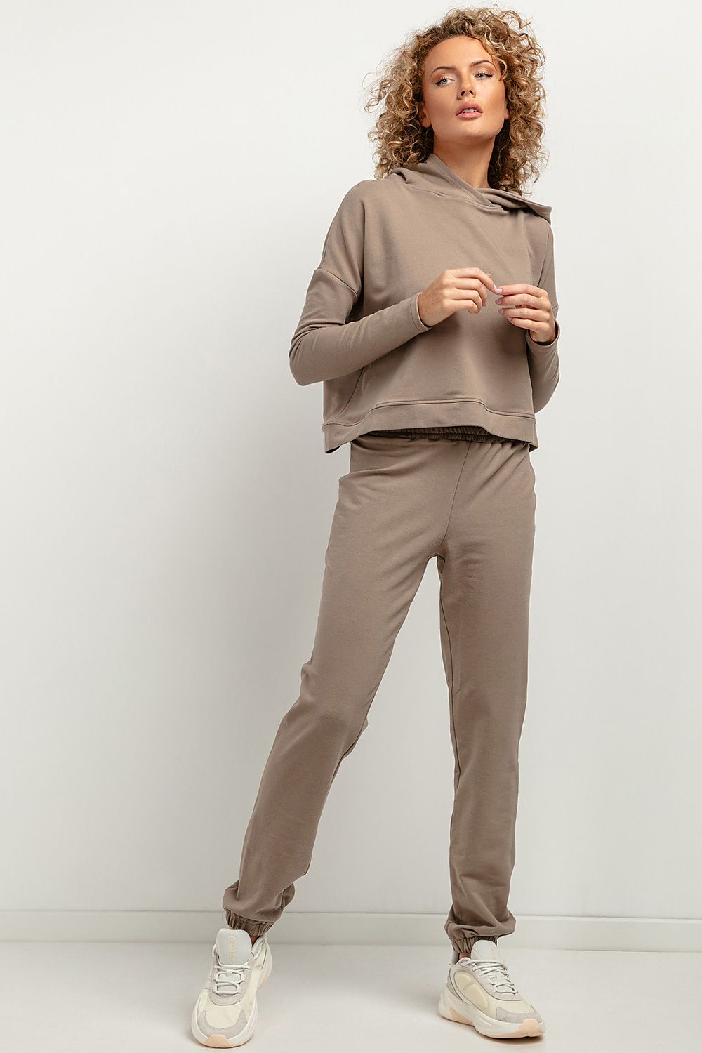 Tessita Luxury Knitted Jogger Sweatpants in various sizes arranged elegantly, perfect for casual luxury.