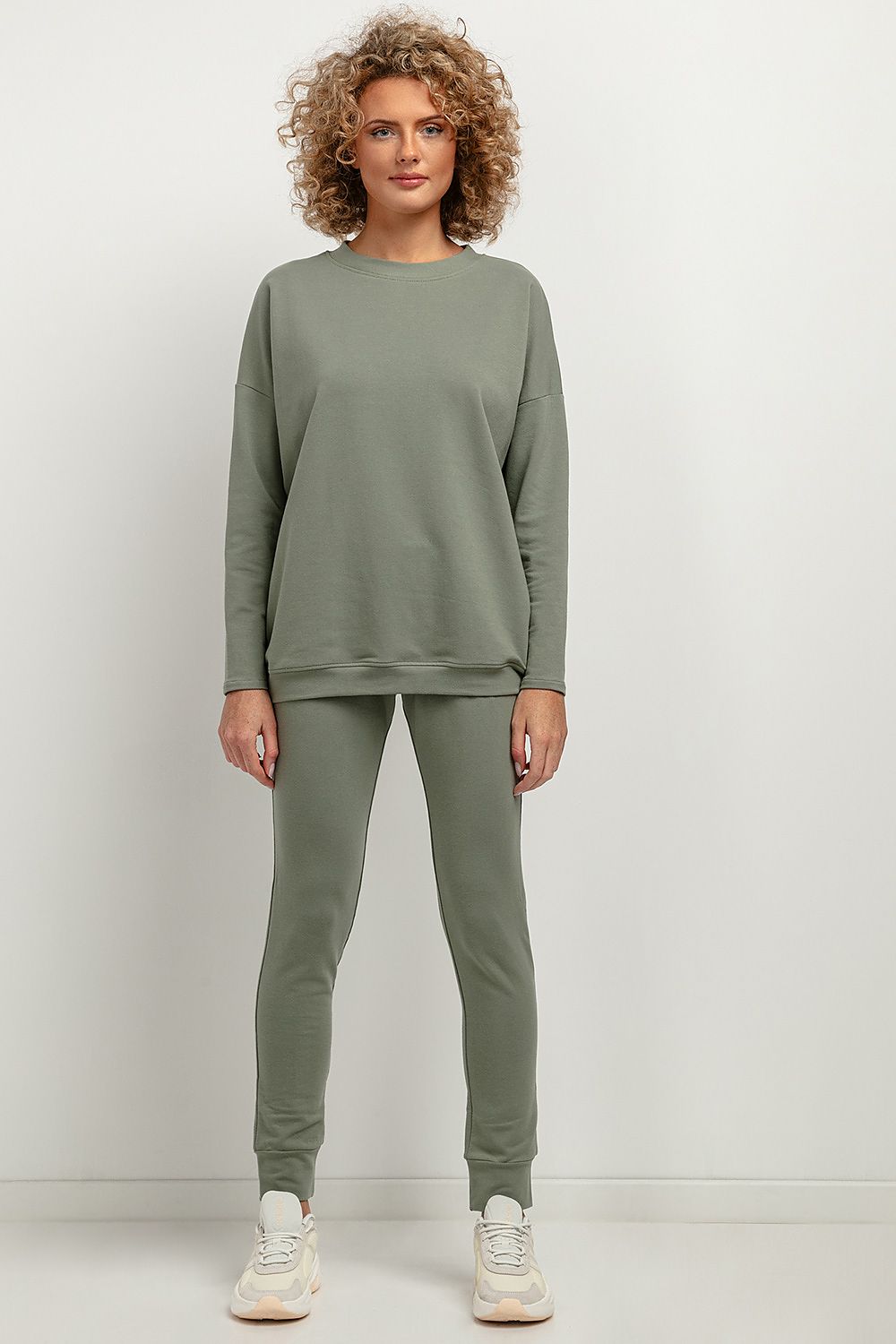 Tessita Elegant Soft Knit Tracksuit Trousers, showcasing a luxurious fabric blend of 70% cotton and 30% polyester, designed with an elastic waistband and cuffs for an upscale look and comfort.