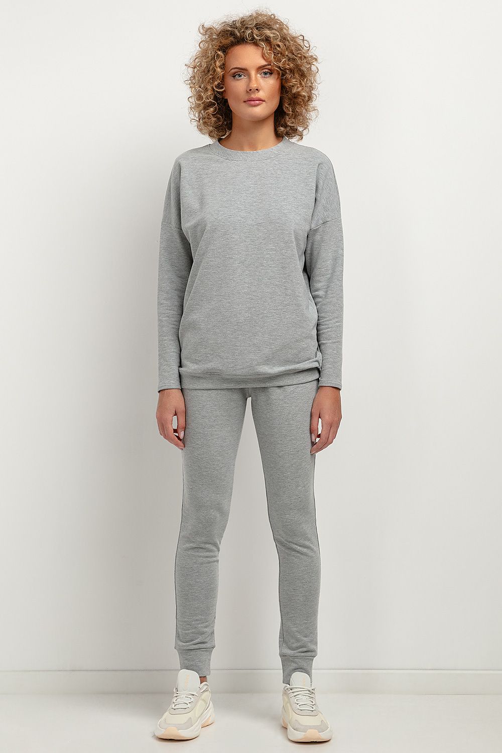 Tessita luxury soft knit tracksuit trousers with elastic waistband, elegantly designed for comfortable fit and style.