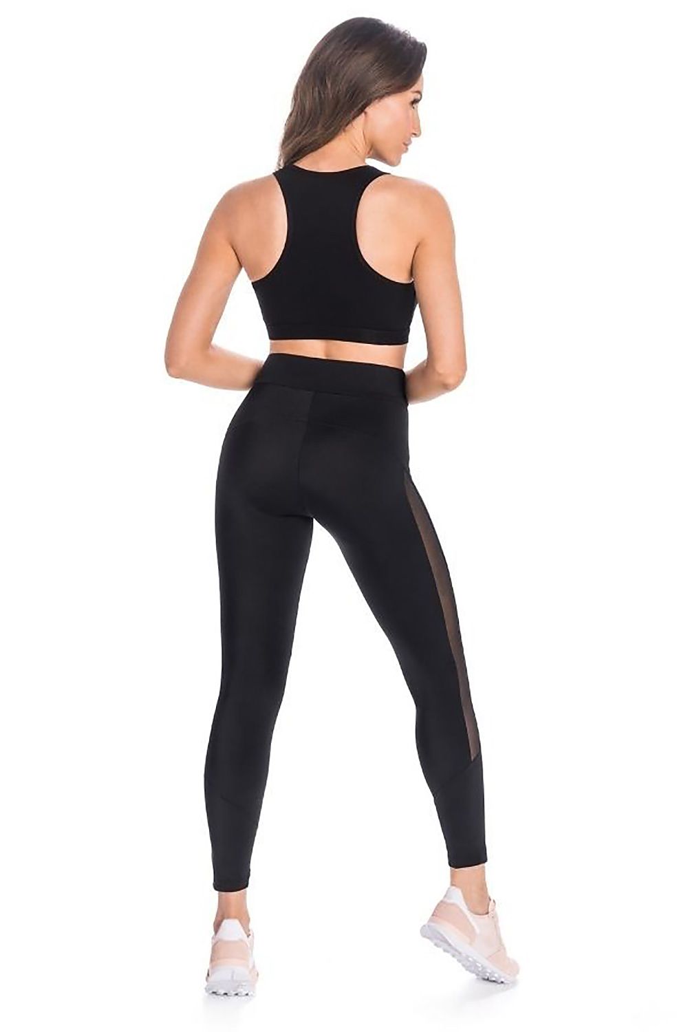 Elegant black leggings featuring a soft mesh accent, designed by Teyli, ideal for workouts and casual wear, enhancing curves with a premium quality finish.