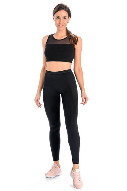 Luxury women's black long leggings by Teyli, crafted from a high-quality cotton blend for optimal comfort and a flattering fit, ideal for both athletic and casual wear.