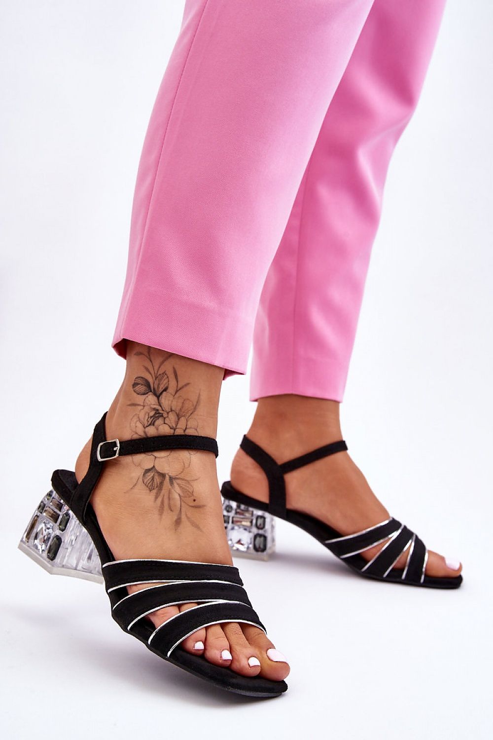 Step in Style's luxurious eco-suede sandals, showcasing embellished block heels. Open square toe design with stylish black straps, ideal for a fashionable look.