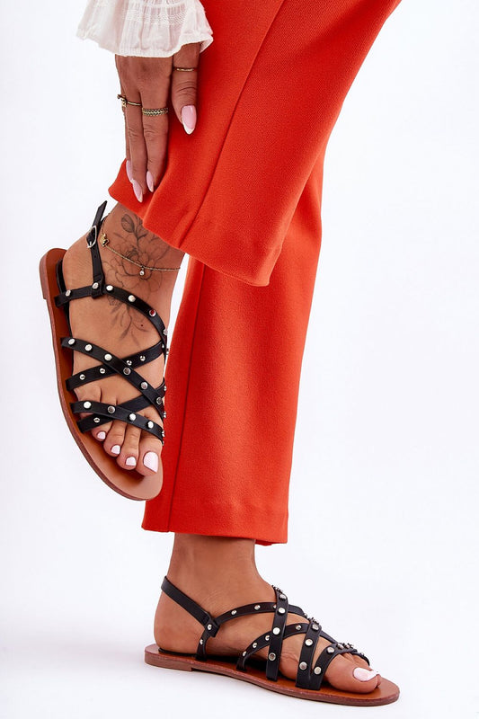Luxury flat sandals for women with a stylish adjustable buckle and chic front embellishments, ideal for summer days from Step in Style.