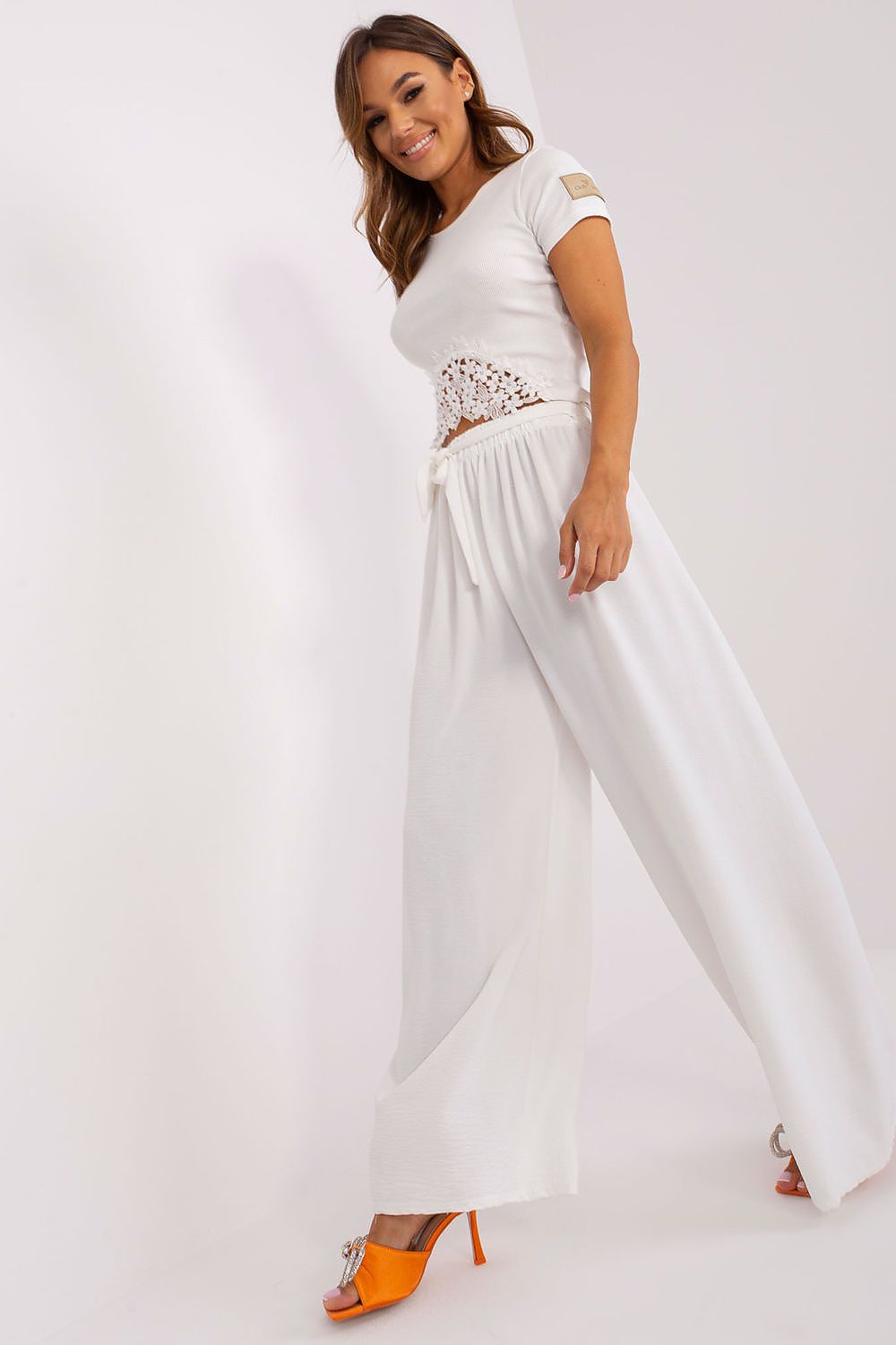 Chic women's wide leg trousers by Och Bella, designed for summer elegance with flattering waist binding for a luxurious fit.