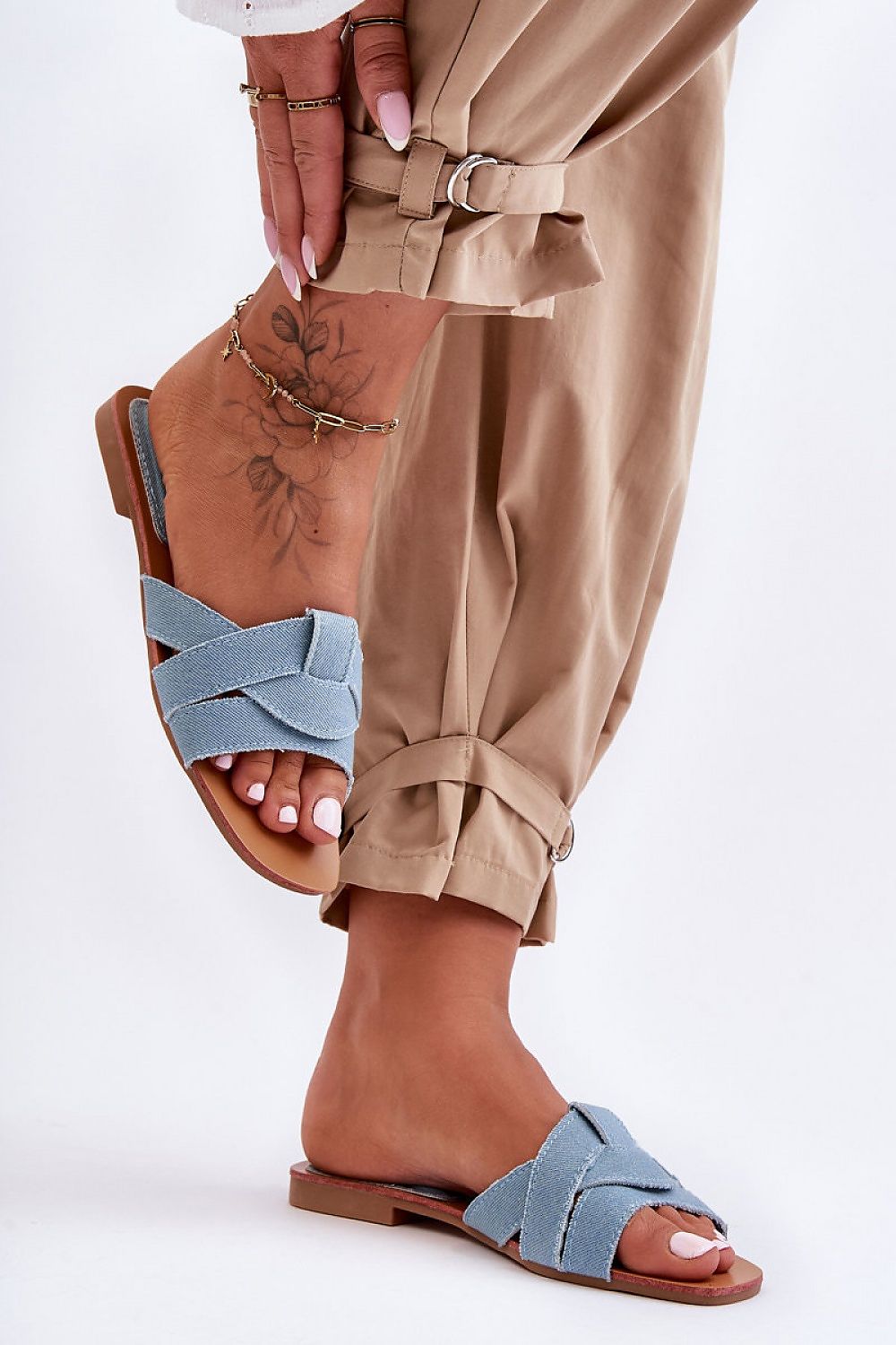 Luxury women's flat-heeled flip-flops with a non-slip sole and elegant design, made by Step in Style.