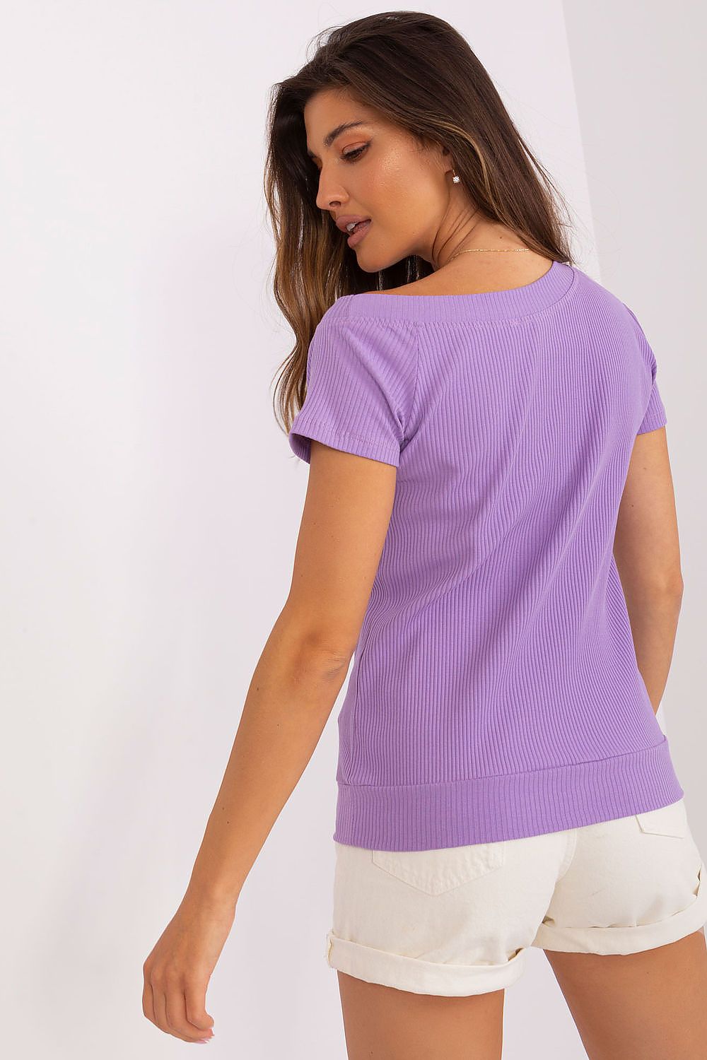 Close-up view of Relevance short sleeve blouse, highlighting ribbed fabric texture and luxurious fit, tailored to EU size 0.