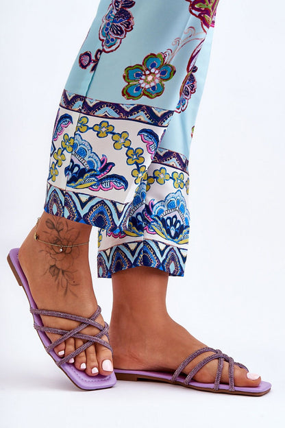 Side view of Luxury Women's Rhinestone-Embellished Flip-Flops by Step in Style, showcasing stylish straps adorned with dazzling rhinestones.