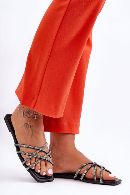 Lifestyle image of women wearing Stylish Rhinestone Flip-Flops by Step in Style, perfect for beach days and casual summer outings.