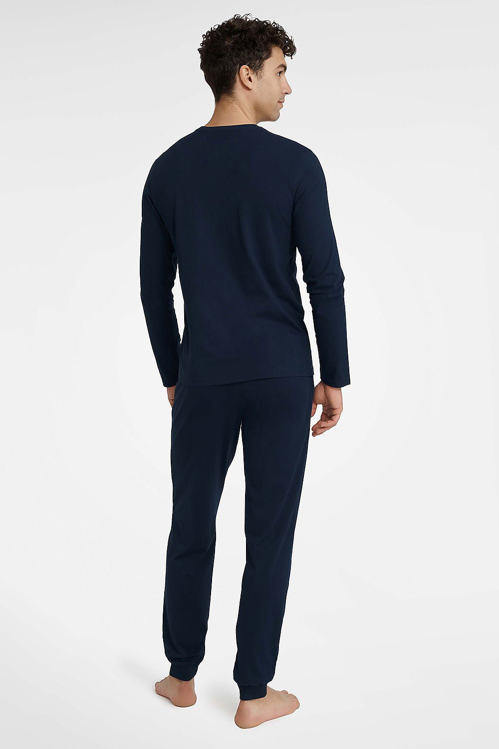 Detail shot of Henderson Men's Cotton Pyjamas Set showcasing the fine fabric and craftsmanship of the long sleeve T-shirt and elastic waistband trousers.