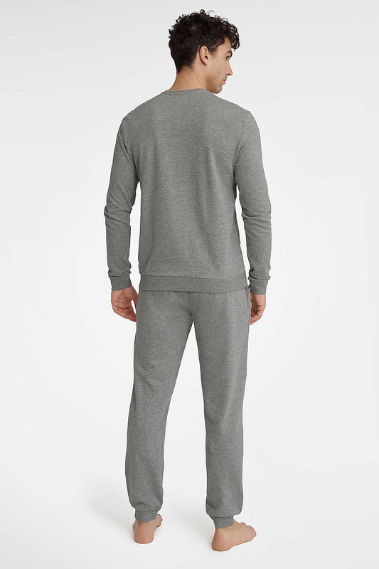 Henderson premium men's pajamas ensemble showcasing a comfortable T-shirt with long sleeves and comfortable long pants, designed for superior relaxation and style.