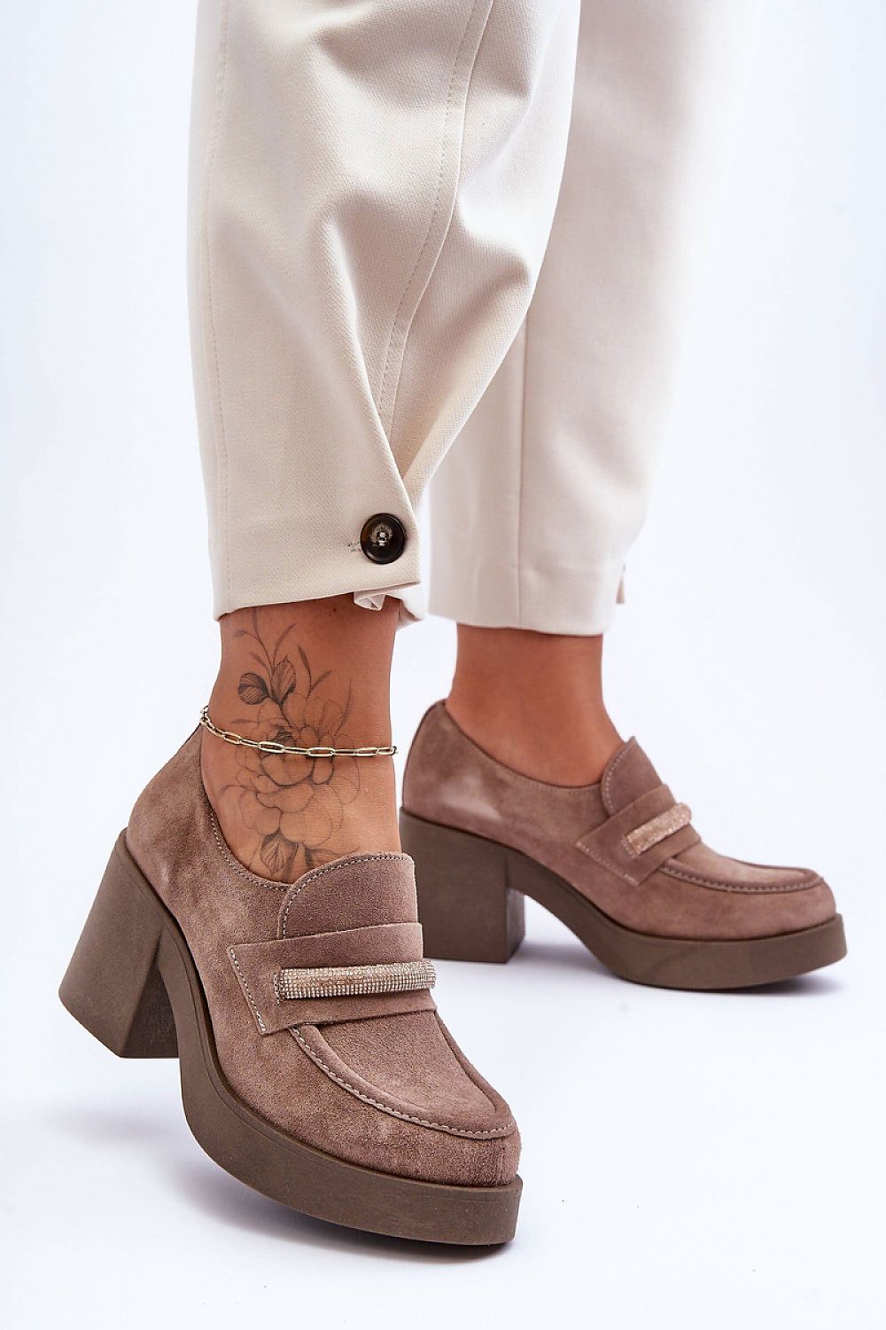 Stylish women's heeled half shoes from Step in style, designed with a wide post heel for stability and crafted from premium natural leather.