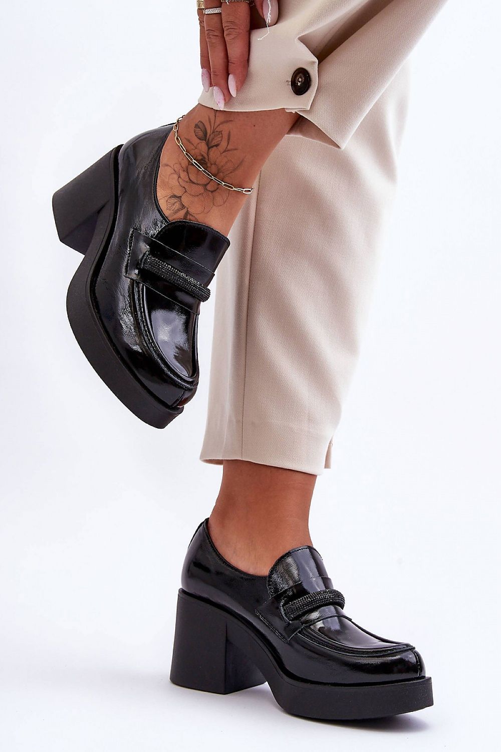 Luxury women's heeled half shoes by Step in Style, made of natural leather with a padded footbed for comfort, showcasing a stylish wide heel and an elegant shiny ornament.