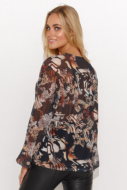 Sophisticated Makadamia women's blouse with a luxurious loose fit and distinctive motifs, ideal for elevating your everyday and evening outfits.