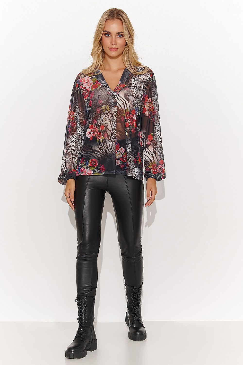 Chic Makadamia Women's Loose Fit Mesh Blouse showcasing unique motifs and vibrant colours, ideal for both casual and sophisticated outfits.
