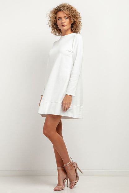 Tessita Knitted Midi Dress styled with accessories, perfect for elegant autumn outings, combining style and comfort.