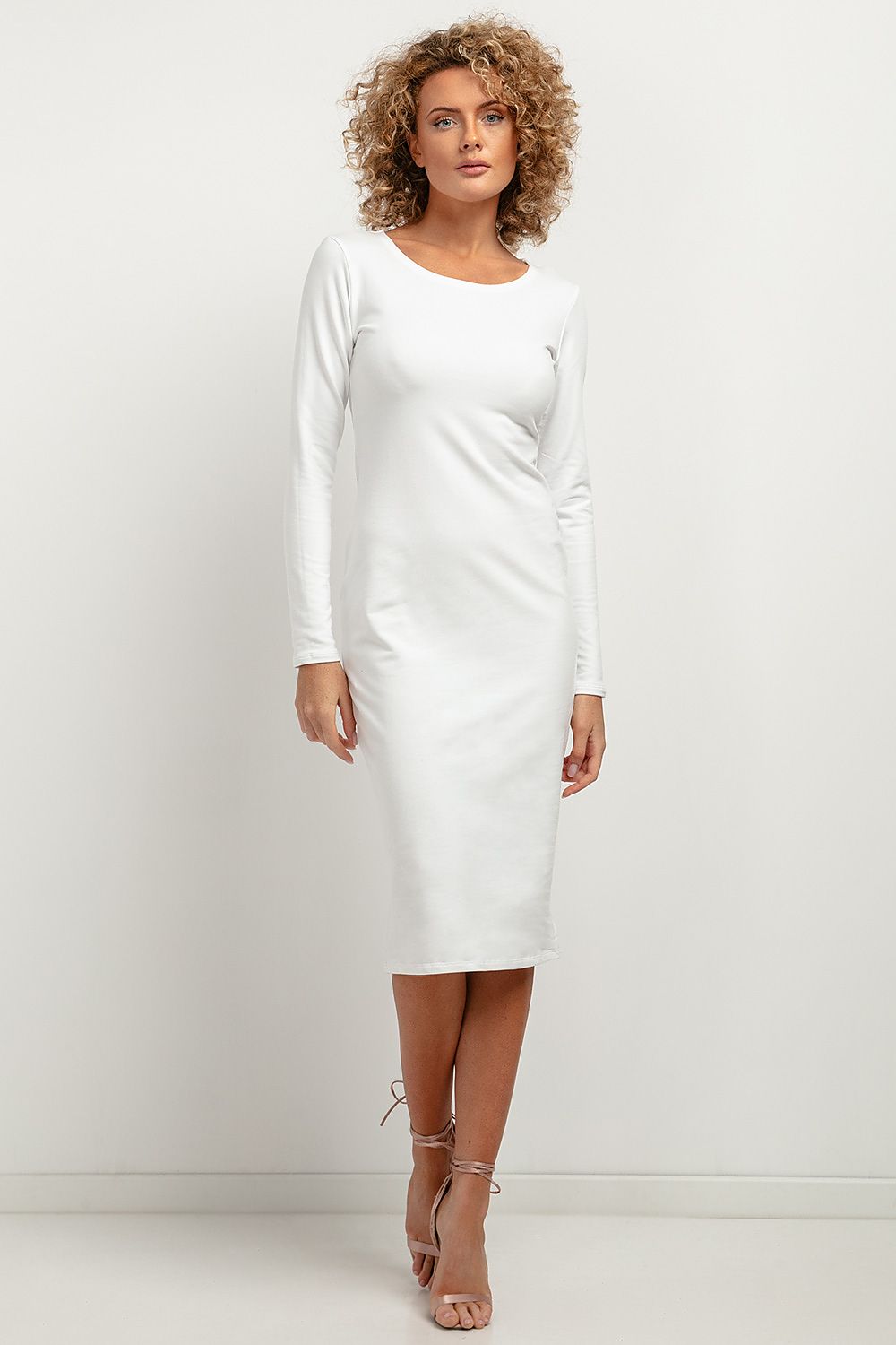 Model wearing Tessita elegant midi dress with a boat neckline, an ideal choice for a chic and fashionable look.