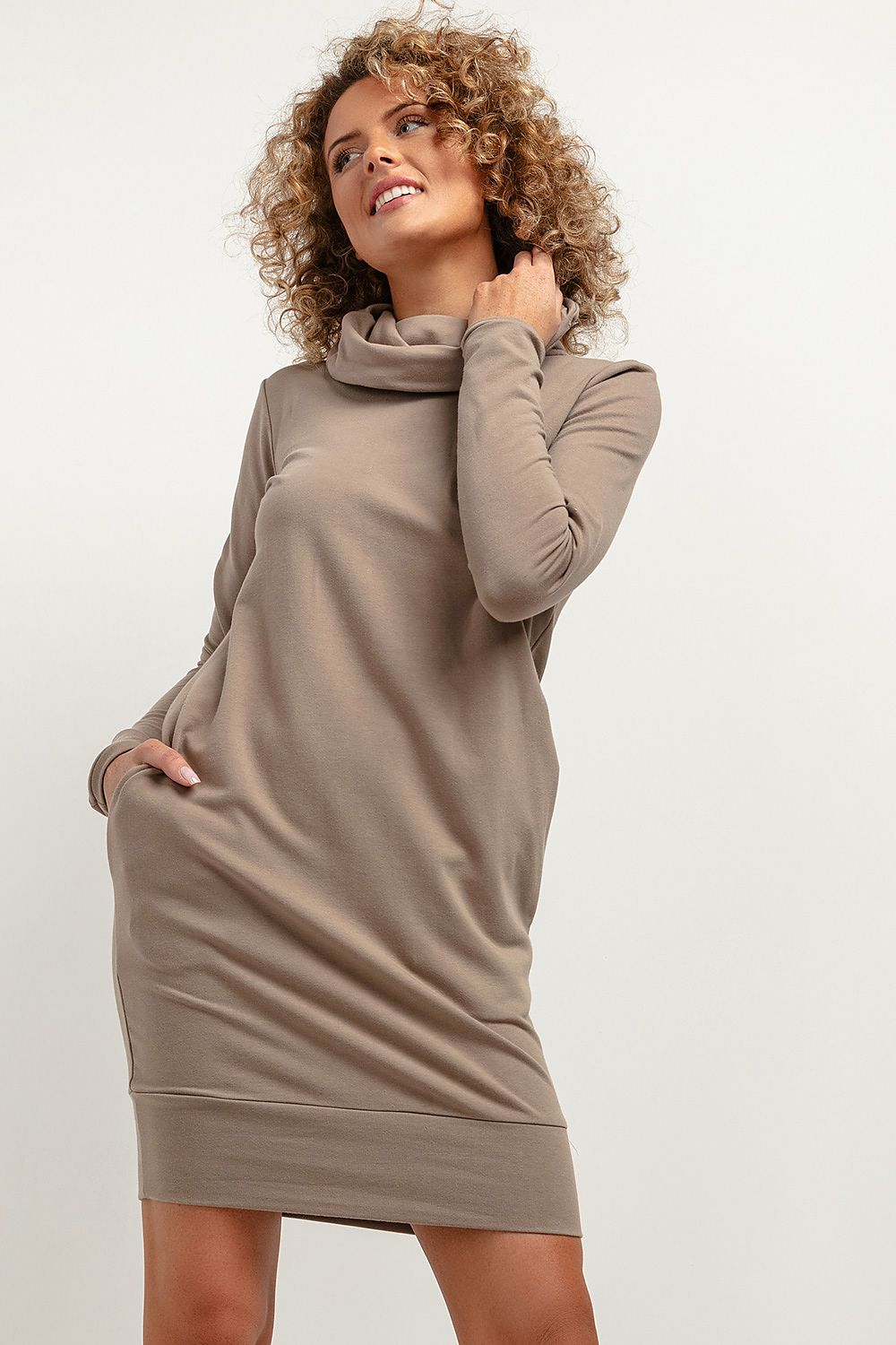 Tessita Daydress displayed in a casual chic outfit, highlighting its versatility for both elegant and casual occasions.