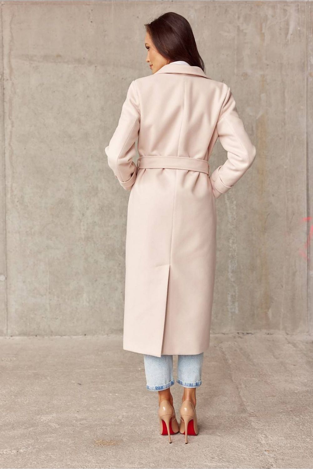 Roco Fashion's versatile coat styled over a chic dress, ideal for transitioning from day to night.