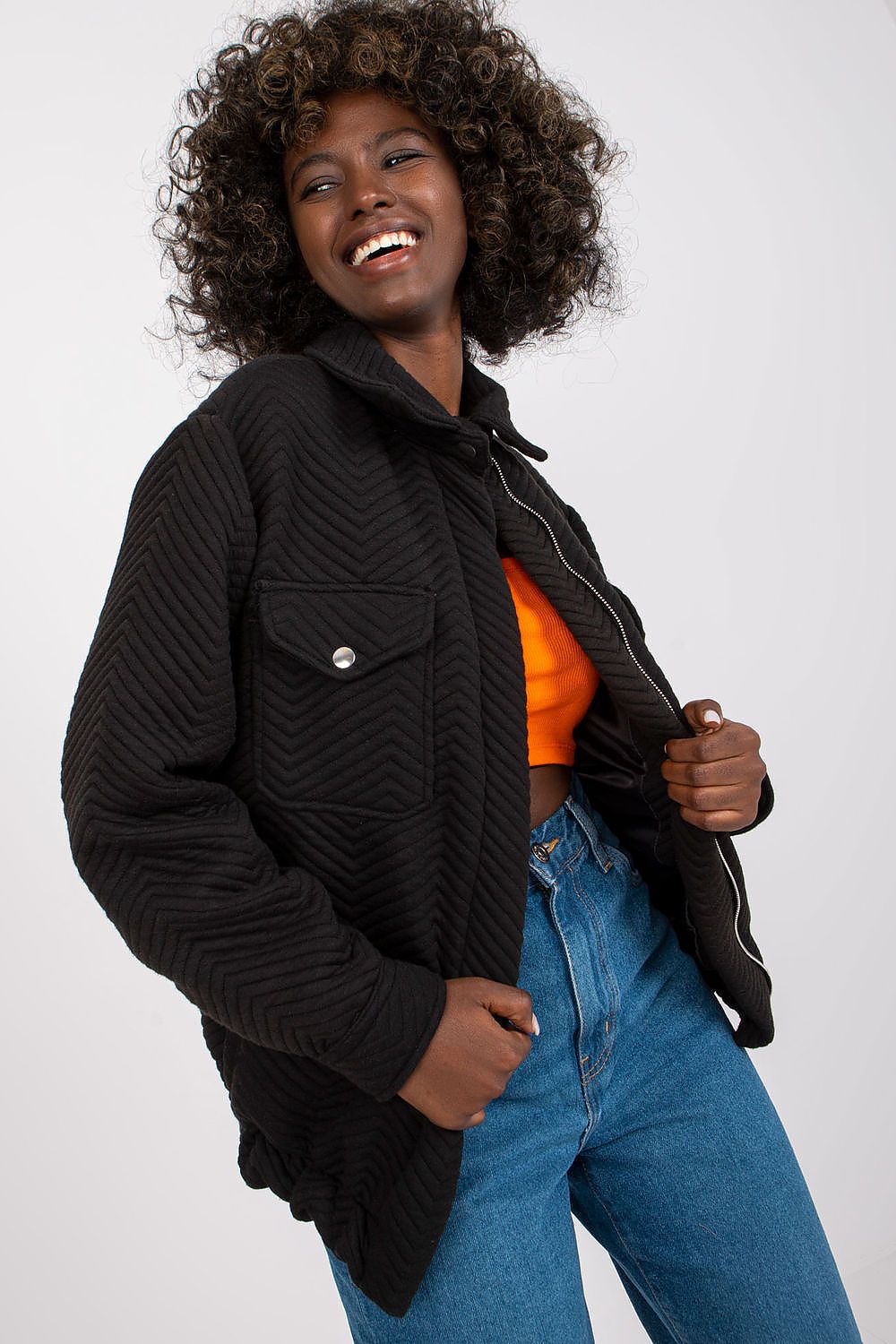 Stylish black quilted transitional jacket by Rue Paris, crafted from 100% polyester, showcasing a chic & warming design for upscale casual wear.