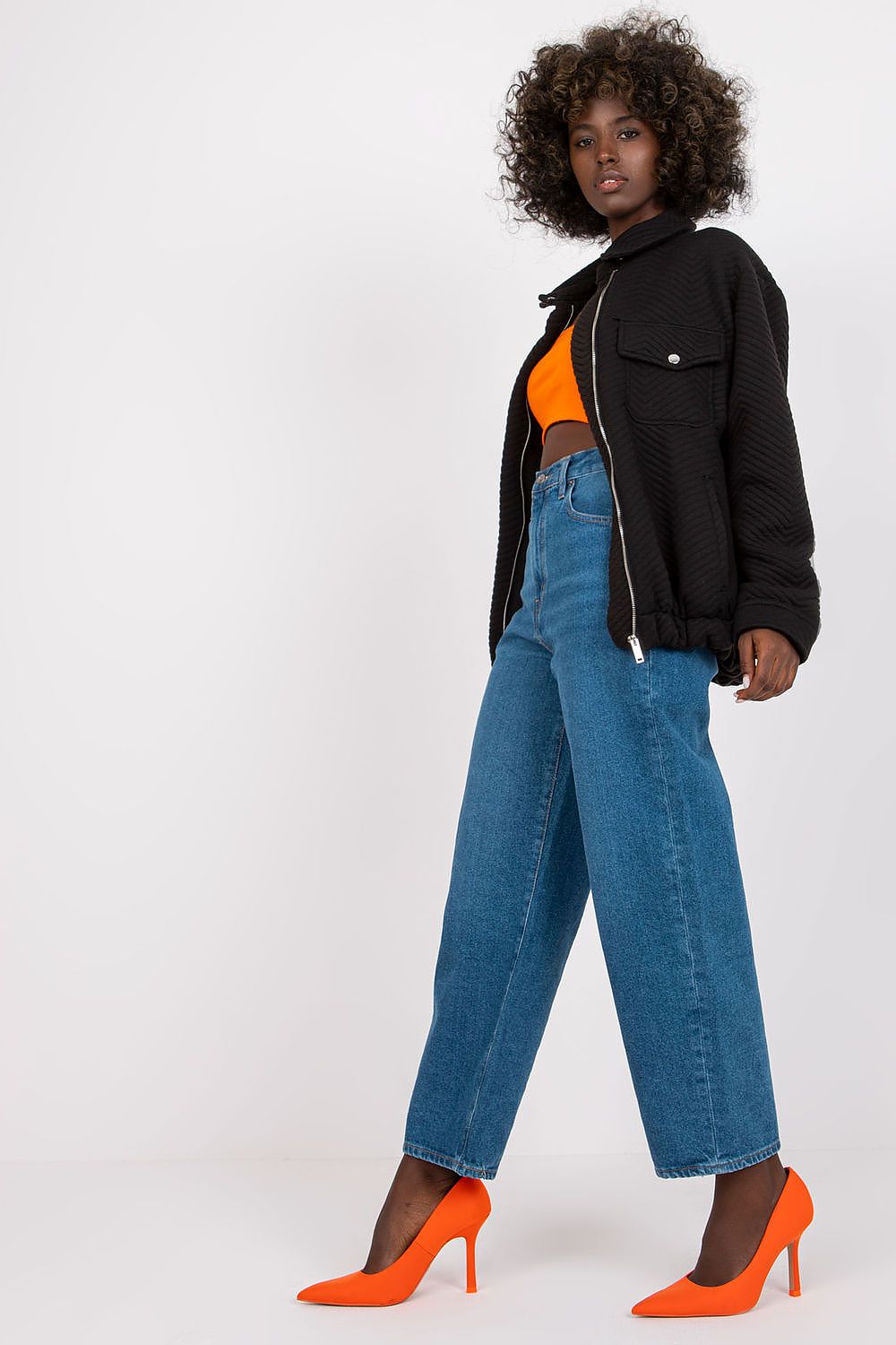 Chic black quilted jacket from Rue Paris, showcasing a minimalist design ideal for urban fashion lovers.