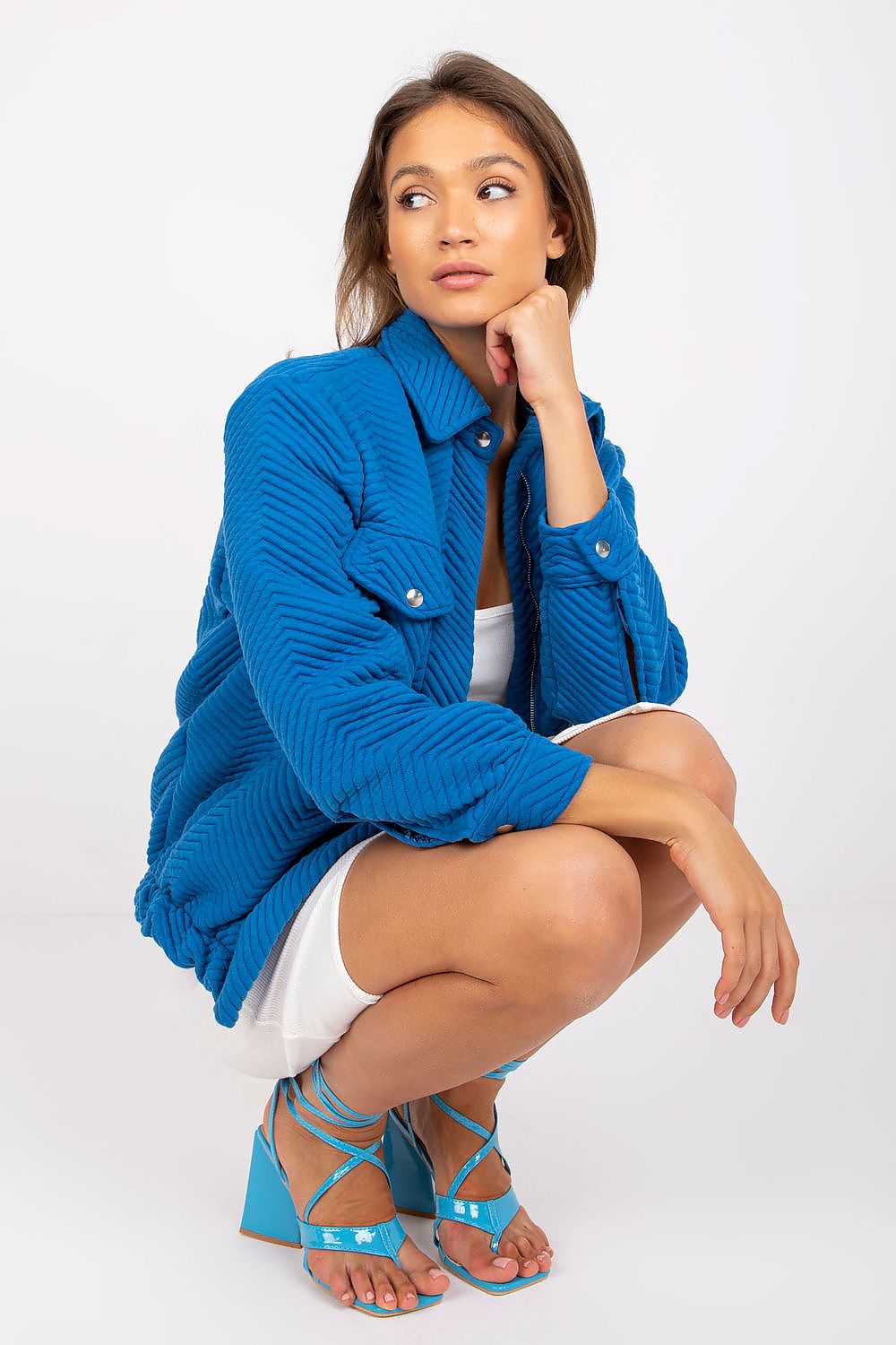 Elegant black quilted transitional jacket by Rue Paris, crafted from 100% polyester for warmth and comfort.