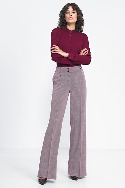 Elegant wide leg trousers by Nife featuring a high waist and luxurious fabric, perfectly tailored to accentuate your silhouette.