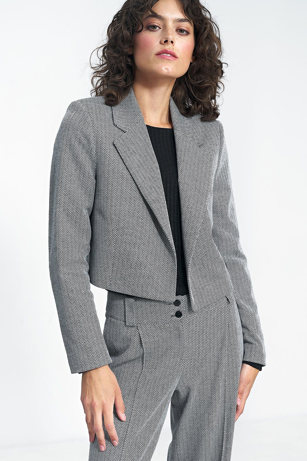 Nife Women's Short Versatile Jacket styled for a trendy outfit, illustrating its versatility for various occasions.