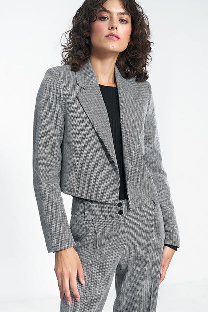 Nife Women's Short Versatile Jacket styled for a trendy outfit, illustrating its versatility for various occasions.