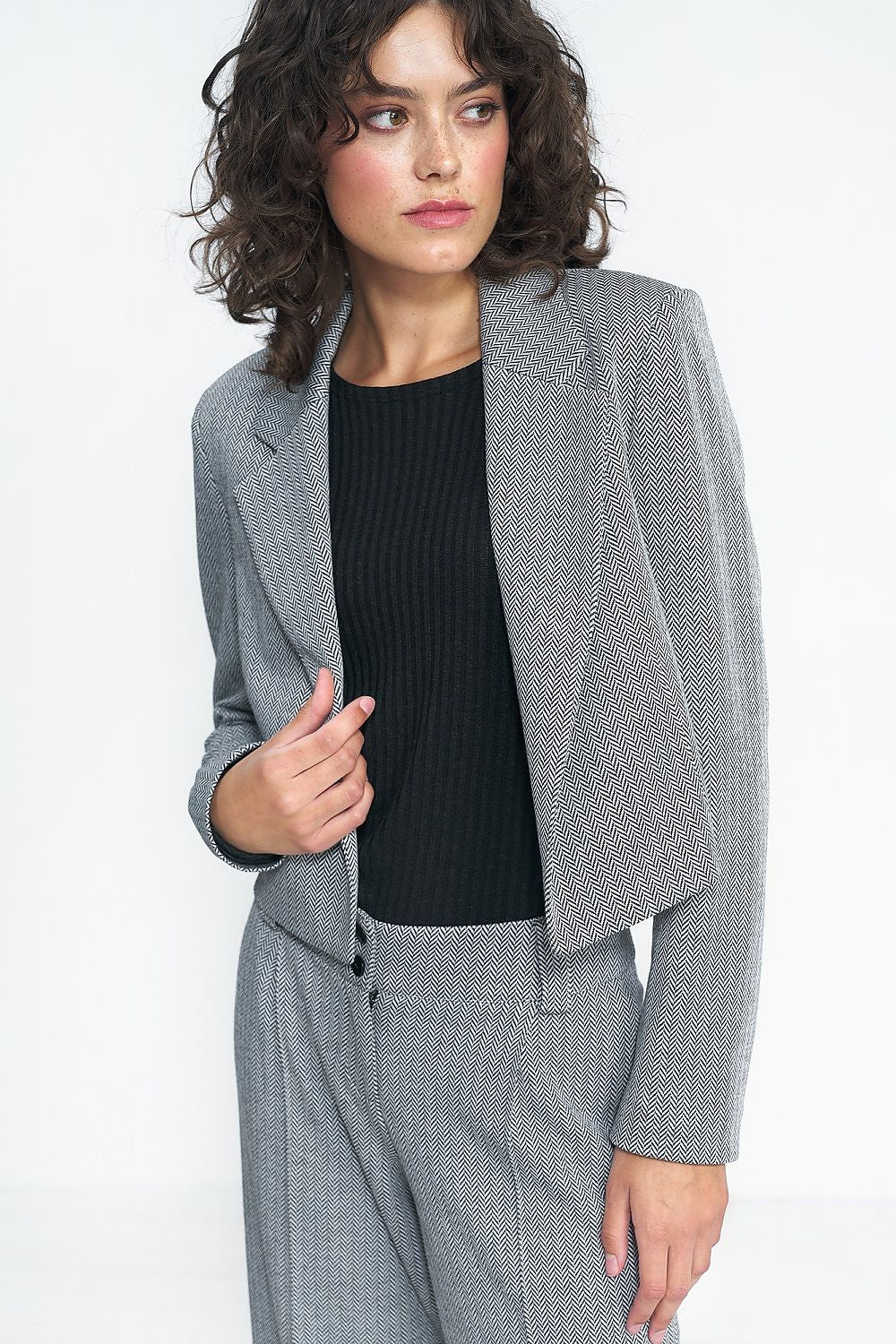 Nife Women's Short Versatile Jacket, elegant design in classic colour, perfect for office and casual wear.
