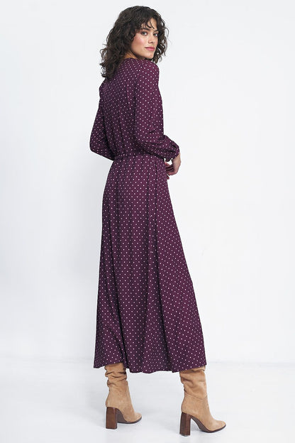 Elegant long dress with peas print by Nife, showcasing luxurious fabric and feminine design, perfect for office and dinner events.