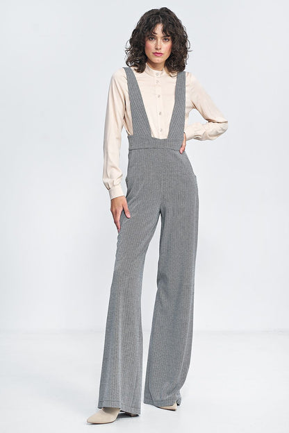 Elegant high-waisted jumpsuit with suspenders by Nife, featuring wide legs and practical pockets for a vintage-inspired look.