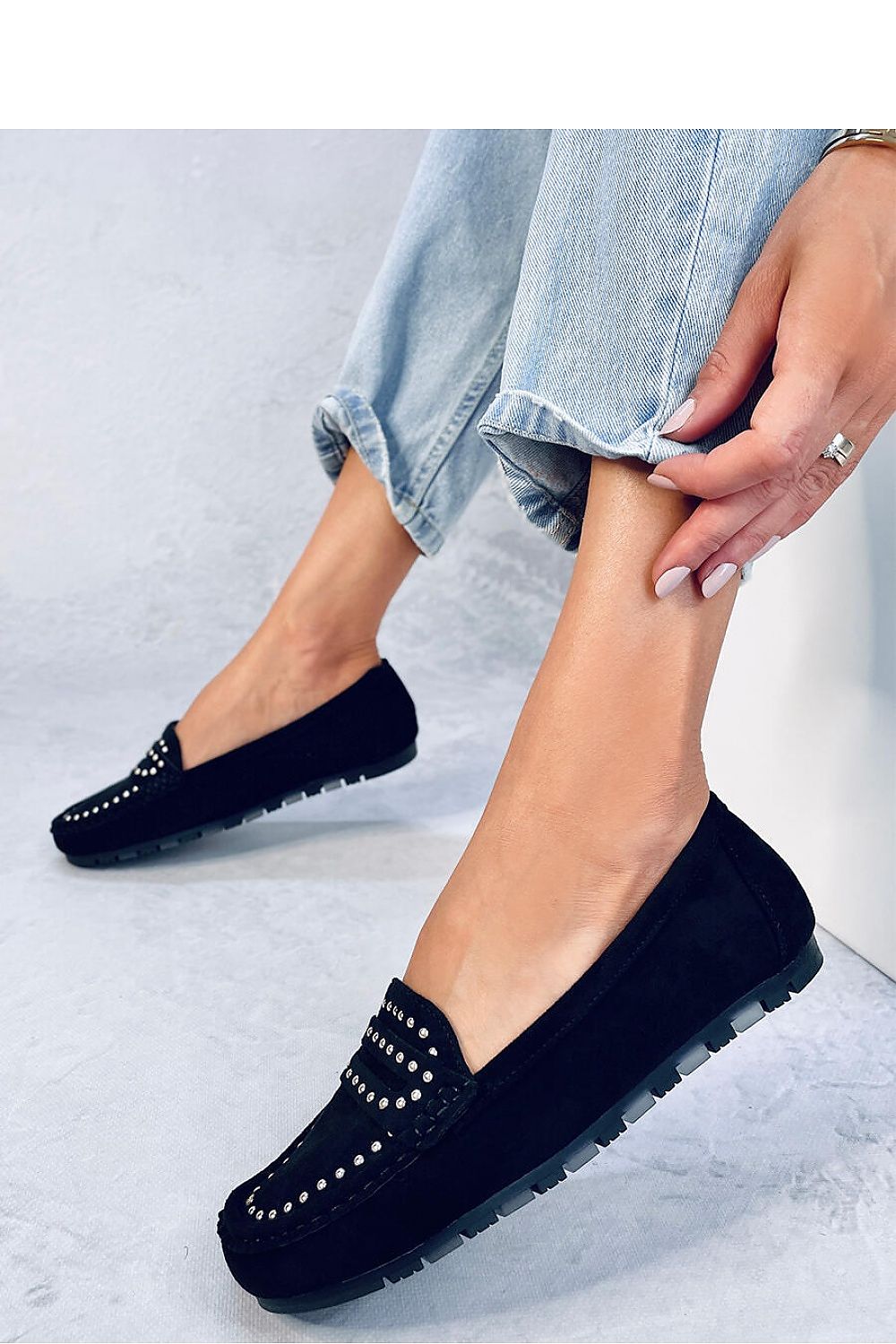 Elegant women's luxury ecological suede moccasins designed by Inello, featuring unique studded detailing for enhanced style and comfort.