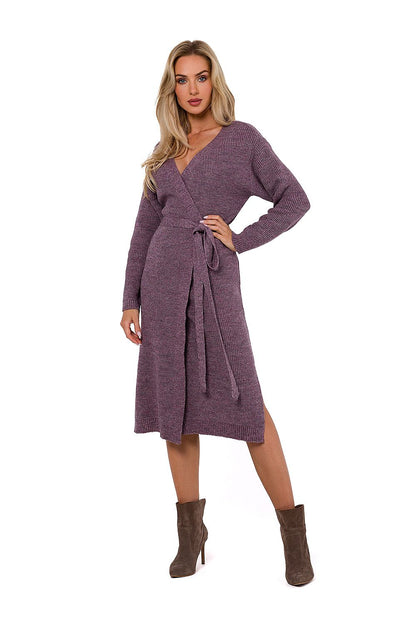 Chic luxury sweater dress by Moe featuring a tie waist and envelope front in a stylish weave, showcasing elegance and comfort.