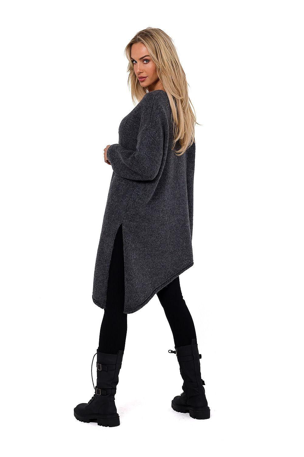 The luxury women's asymmetrical V-neck sweater by Moe displayed on a mannequin, epitomizing sophisticated fashion and comfort.