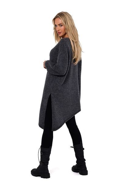 The luxury women's asymmetrical V-neck sweater by Moe displayed on a mannequin, epitomizing sophisticated fashion and comfort.