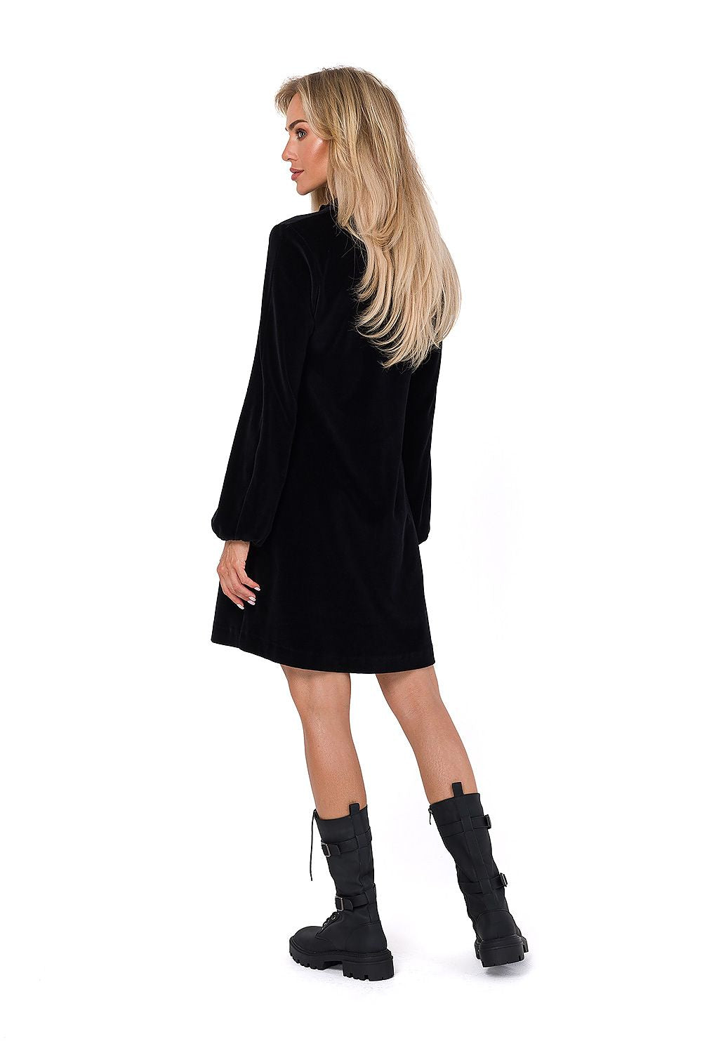 A detailed view of the V neckline and long sleeves of the Moe velour dress, emphasizing its luxurious silhouette.