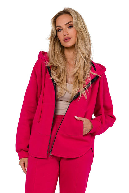 Elegant women's knitted zipper sweatshirt from Moe, featuring a kangaroo pocket and long sleeves, showcasing luxurious Polish design.