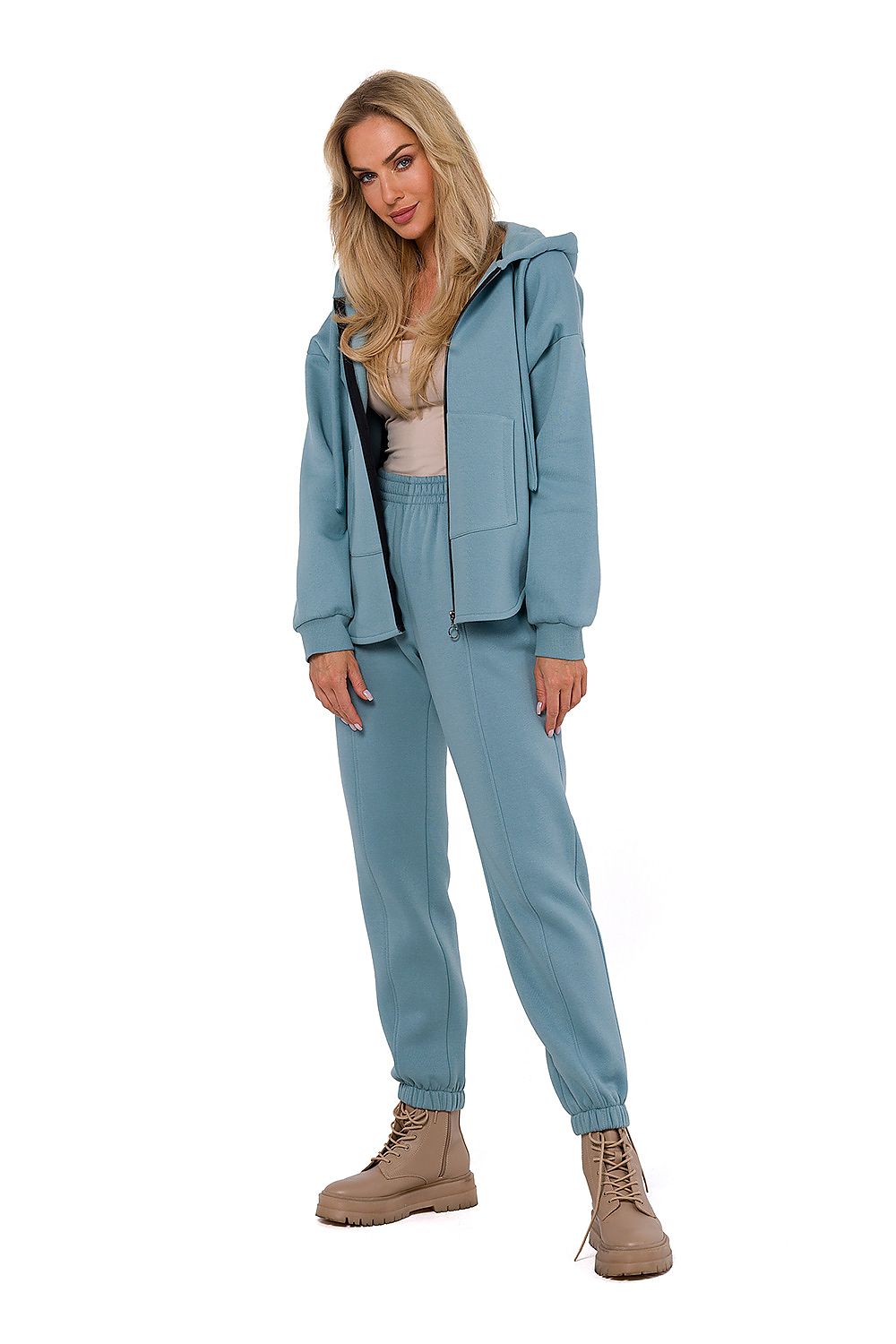 The exquisite stitching and attention to detail on Moe's elegant knitted zipper sweatshirt for women.